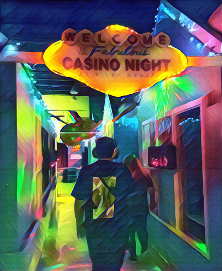 Michael walking under a sign for Casino Night.
