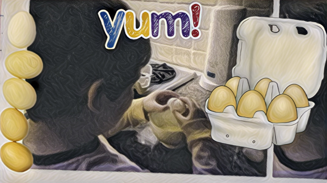 Mikey cracking eggs for breakfast.