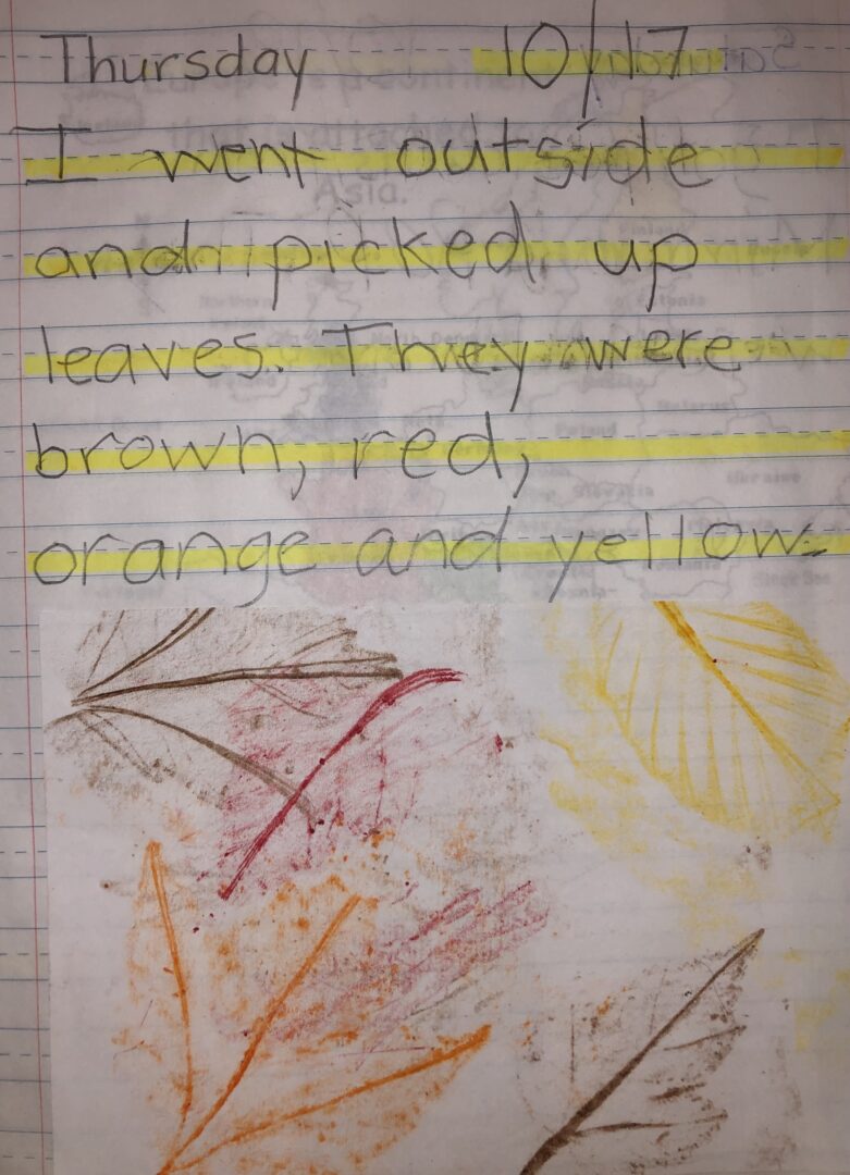 Mikey's journal entry from 10/17/13. Leaf rubbings in different colors. I went outside and picked up leaves. They were brown, red, orange and yellow.
