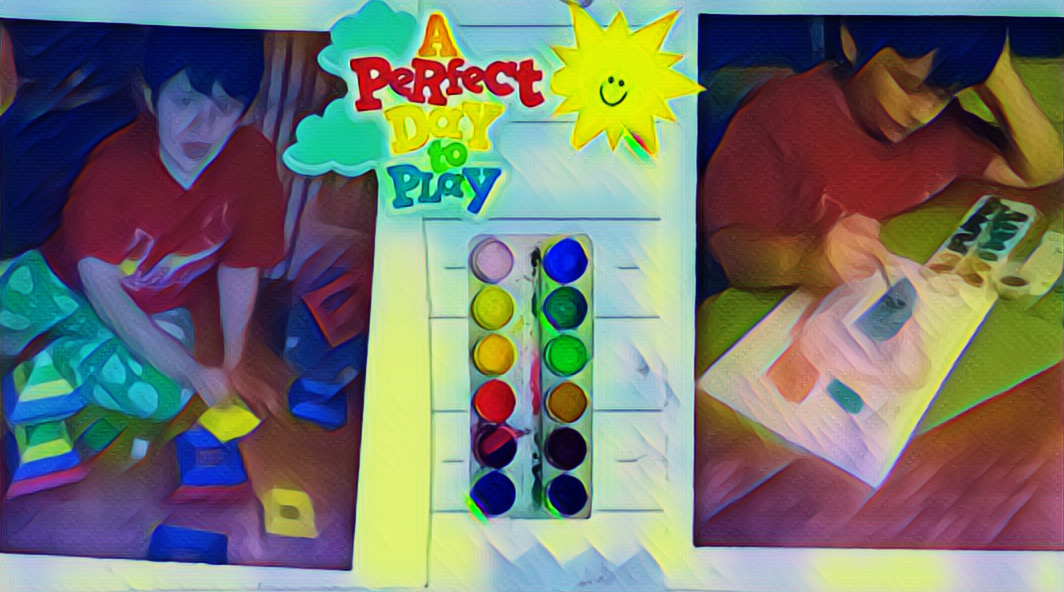 Mikey with colorful watercolors and blocks.