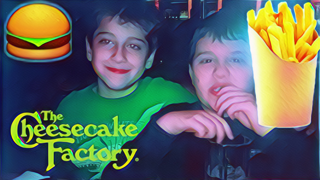6DD55F00-0CF2-4923-B132-4D4423A9C763 Will and Mikey smiling at Cheesecake Factory. Mikey drinking his water from a straw.