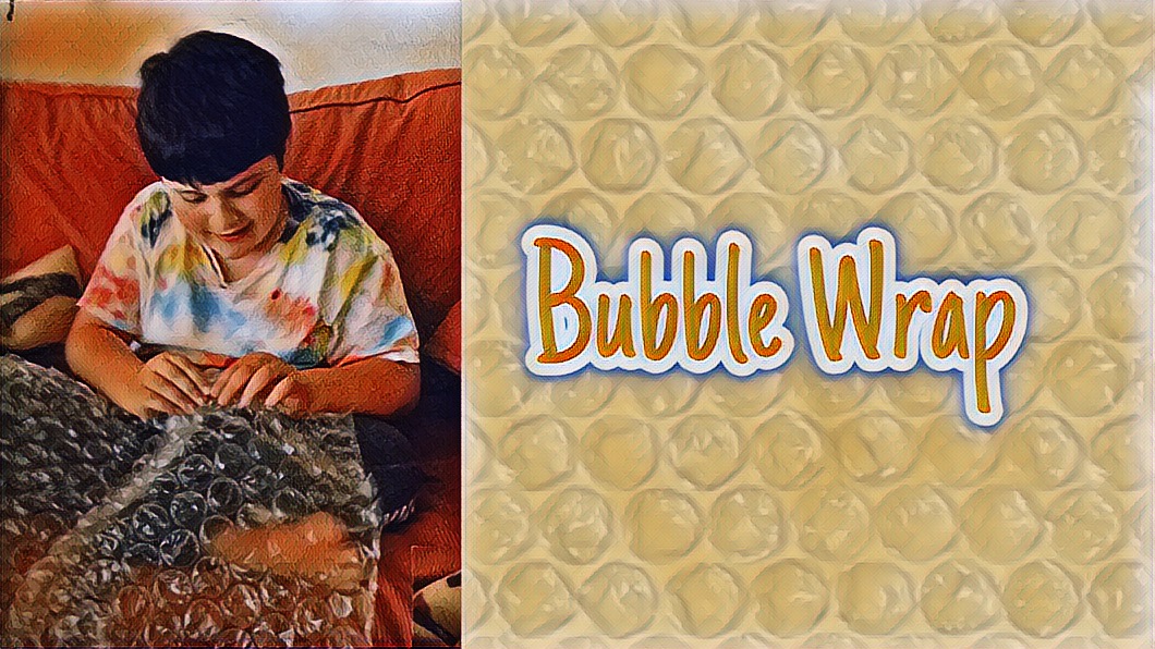 Bubble wrap close up and Mikey sitting on the couch popping his bubble wrap.