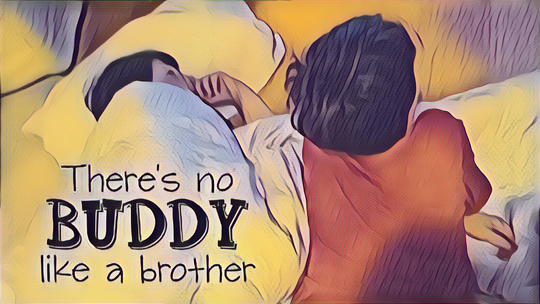 2DEA03E5-2670-42E9-878E-E988240A82B2 "there's no buddy like a brother." stylized photo of Will and Mikey lying on the floor with pillows and a blanket watching TV.