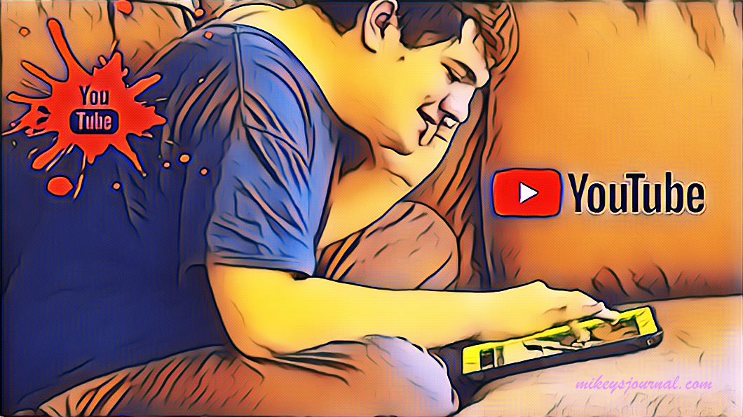 Mikey sitting on the couch using his iPad with the YouTube logo looming large.