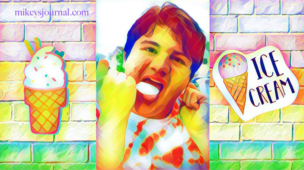 sherbet colored bricks with ice cream cones flanking Mikey's face as he eats his ice cream off of a plastic spoon.