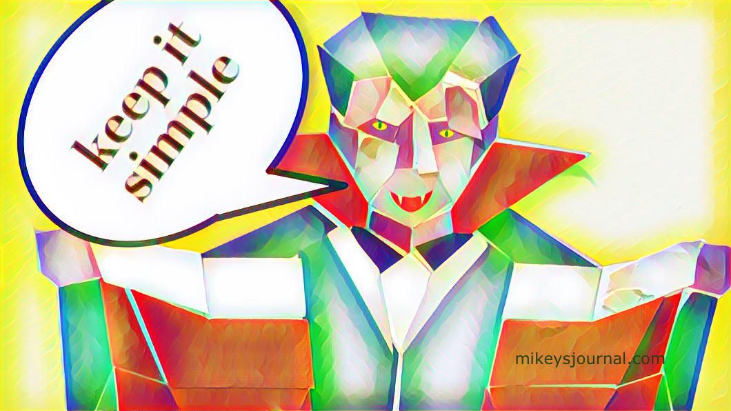 vampire, mouth open, sticker puzzle with a speech bubble and the words 'keep it simple'