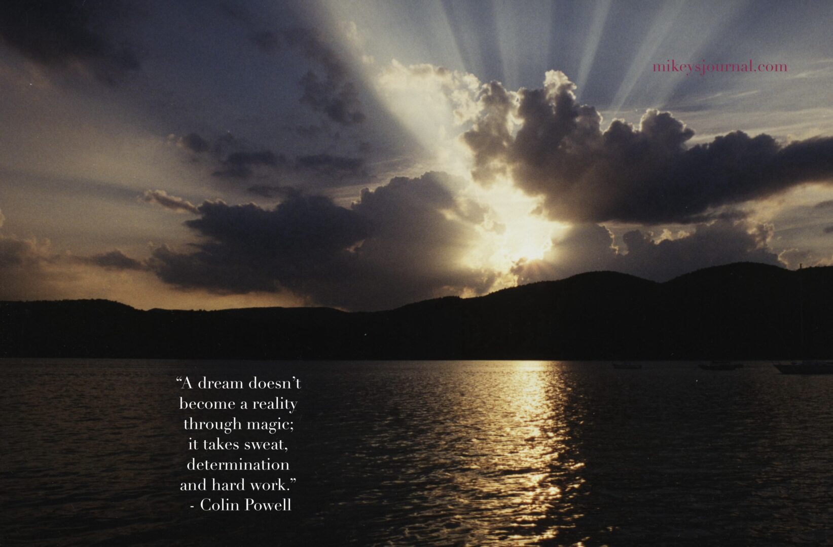 a lake with mountains in the background, the sun beaming through the clouds and reflecting off the water. Quote: “a dream doesn’t become a reality through magicl it takes sweat, determination and hard work.” - Colin Powell