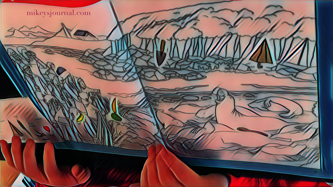 stylized photo of Mikey’s hands holding his hidden picture book open, some stickers already stuck on the hidden images.