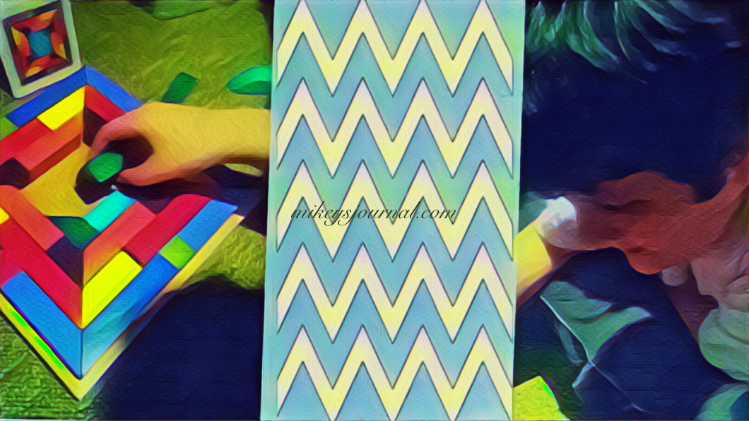 zig zag pattern sticker separating a photo of Mikey’s hand putting a piece of the pattern block puzzle in and a picture of Mikey’s face happily concentrating.