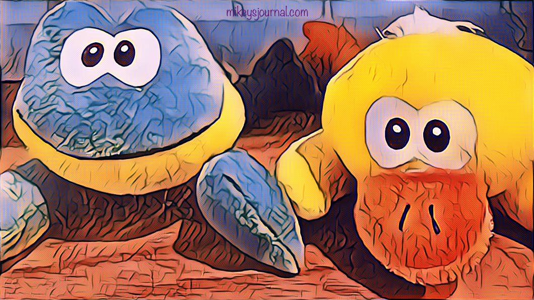 stylized photo of a frog and a duck stuffed animal