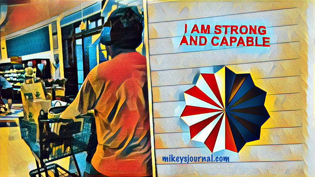 Mikey pushing the grocery cart with the title “I AM STRONG AND CAPABLE."