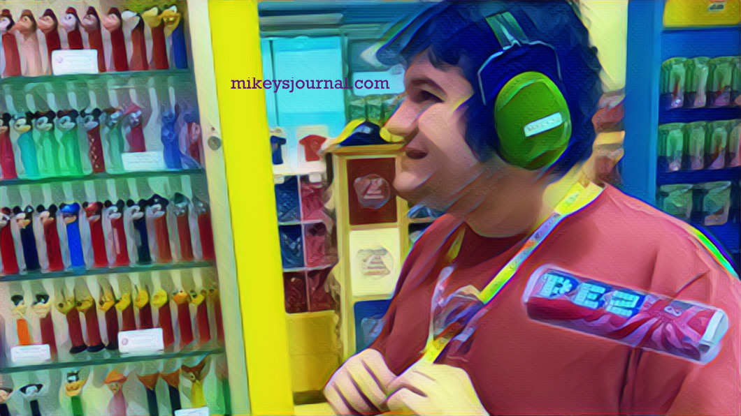 8D965C52-9360-40D1-A961-E3D833480F77 stylized photo of mikey looking at the display of al the pez dispensers