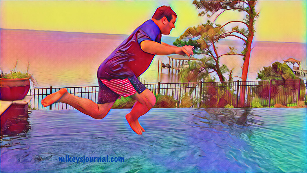 stylized photo of Mikey jumping into the pool