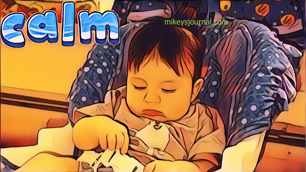 baby mikey calmly checkin out his baby swing seatblet